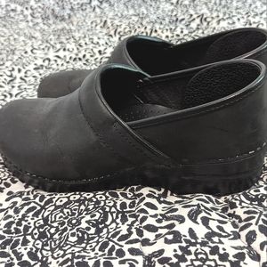 Dansko black leather clogs